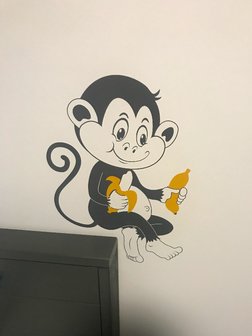 Muursticker Aap met bananen | muurenstickers.nl